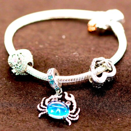 Sterling Silver Flexible Snake Charm Bracelet with Crab Accented with Blue Stone, Open Heart Charm, And Solid Heart Shaped Bead Charms Accented with High Polished Clasp CZ & Two Hanging Leaves