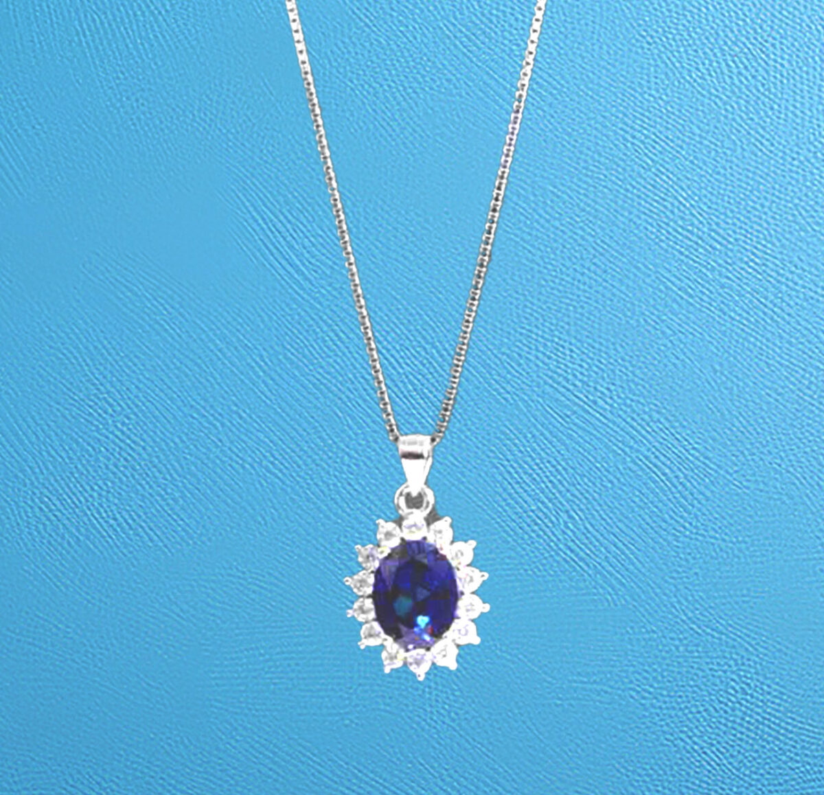 Sterling Silver Oval Shaped Lab Created Non-Treated Sapphire Pendant 925ijewel.com