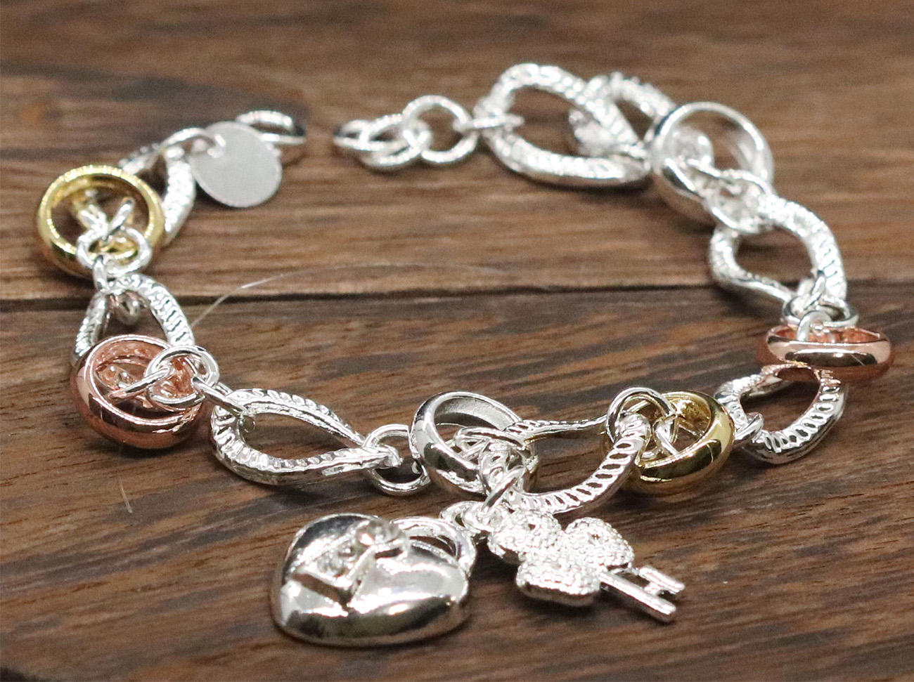 Sterling silver two-tone link bracelet with shamrock and heart key charms 925ijewel.com