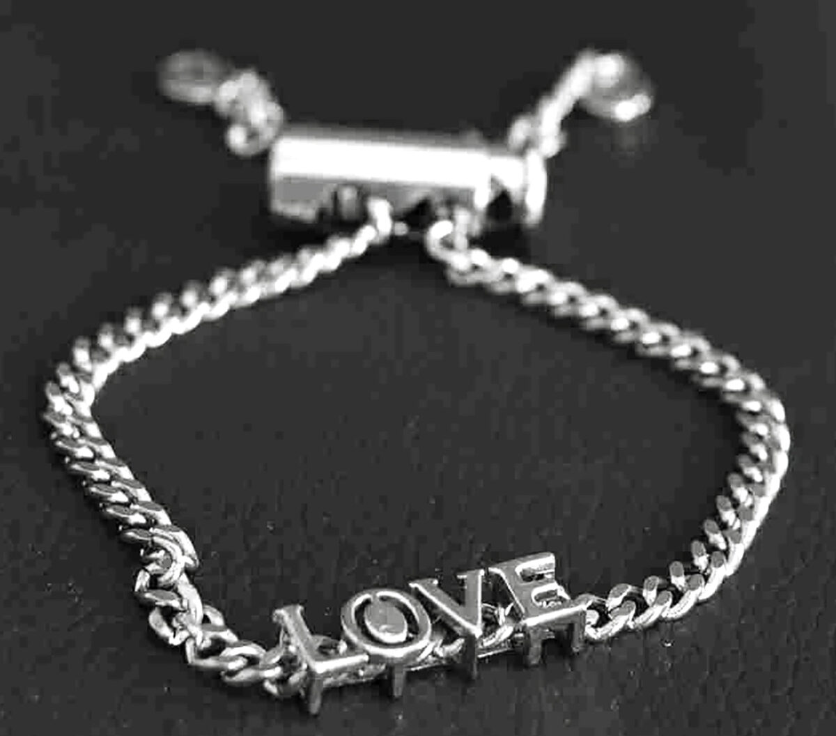 Sterling Silver Platinum Look Bracelet with Sliding Love Charm and Adjustable Lock. 925ijewel.com