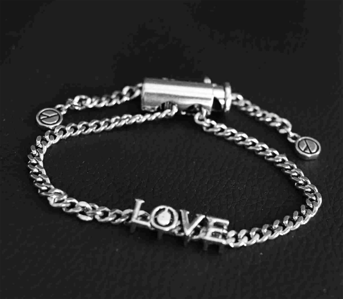Sterling Silver Platinum Look Bracelet with Sliding Love Charm and Adjustable Lock. 925ijewel.com