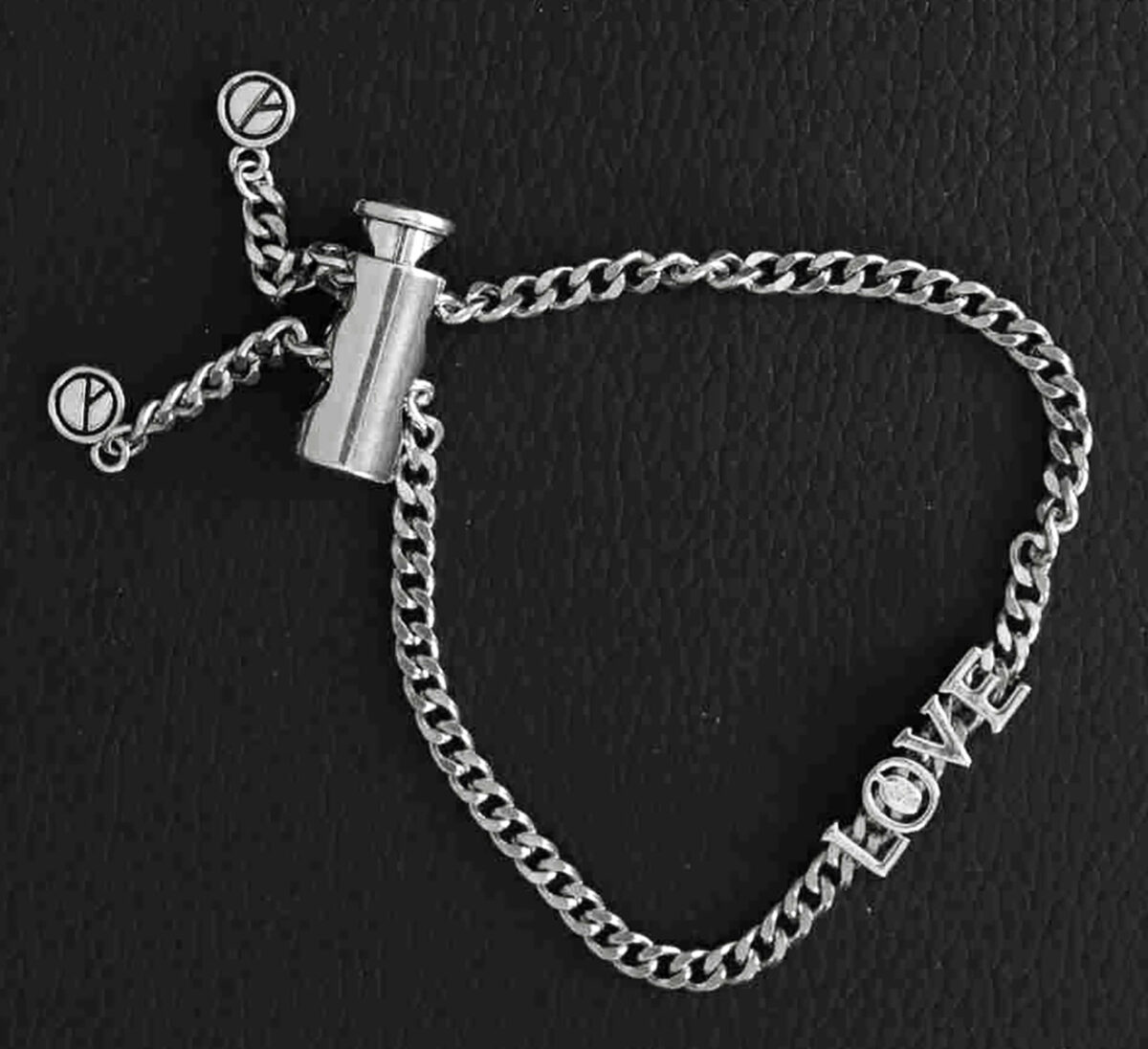Sterling Silver Platinum Look Bracelet with Sliding Love Charm and Adjustable Lock. 925ijewel.com