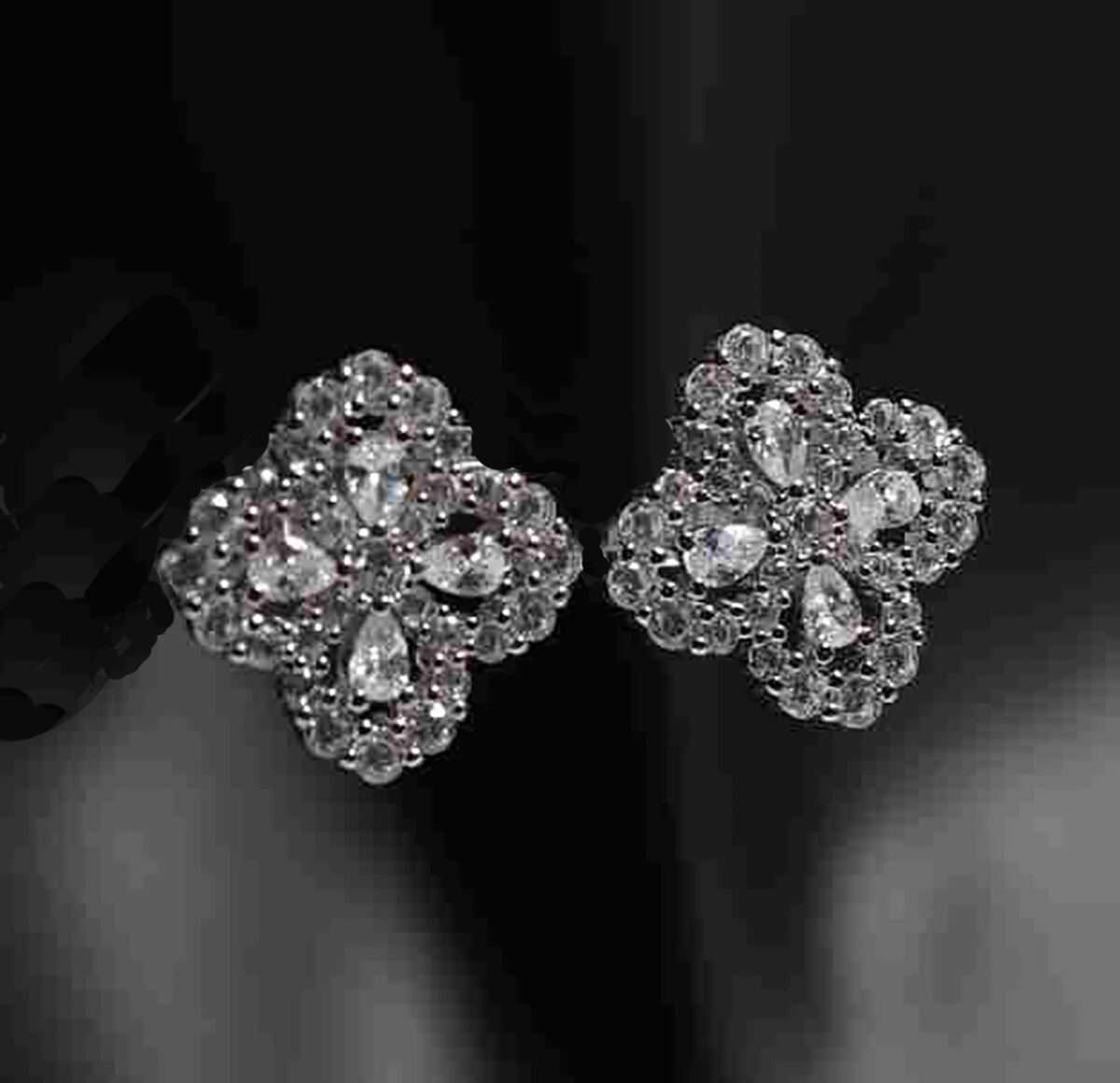 Elegant Sterling Silver Four Flower CZ Stud Earrings 925ijewel.com