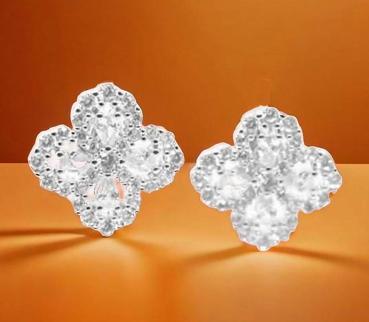 Elegant Sterling Silver Four Flower CZ Stud Earrings 925ijewel.com