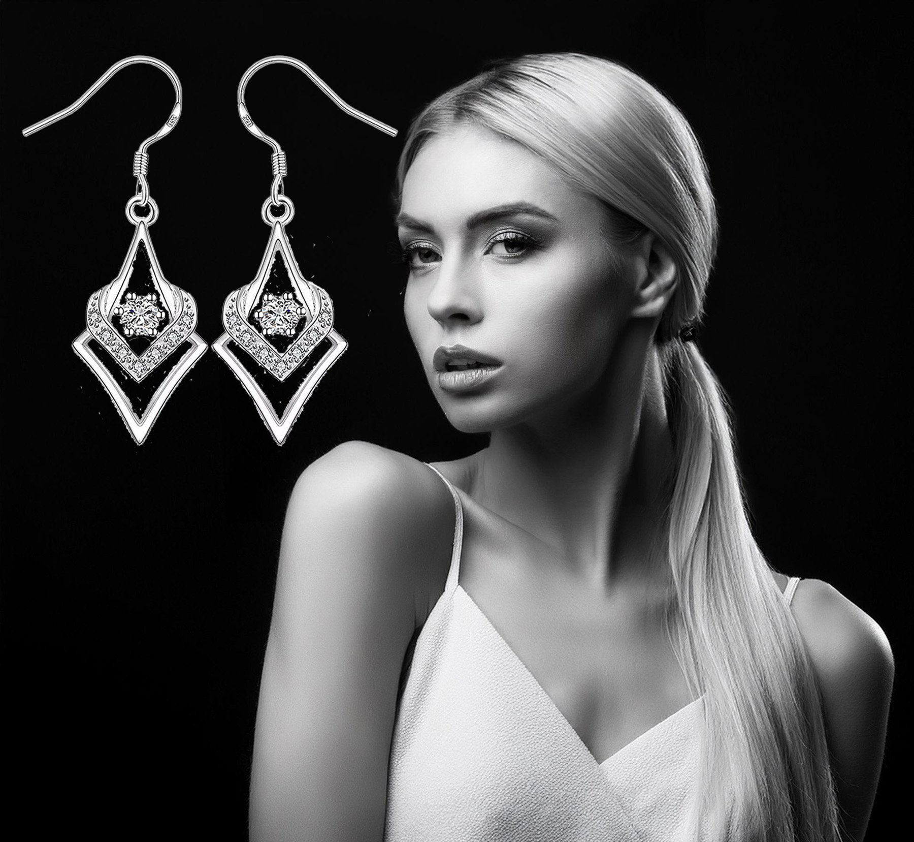 Sterling Silver Abstract Heart Design Cubic Zirconia Dangle Earrings 925ijewel.com