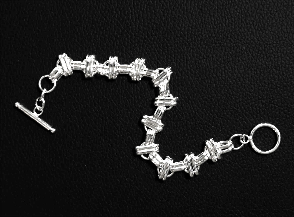 Sterling Silver Interlinked Grace Double Bar and Spaced Circles Bracelet with Toggle Clasp. 925ijewel.com