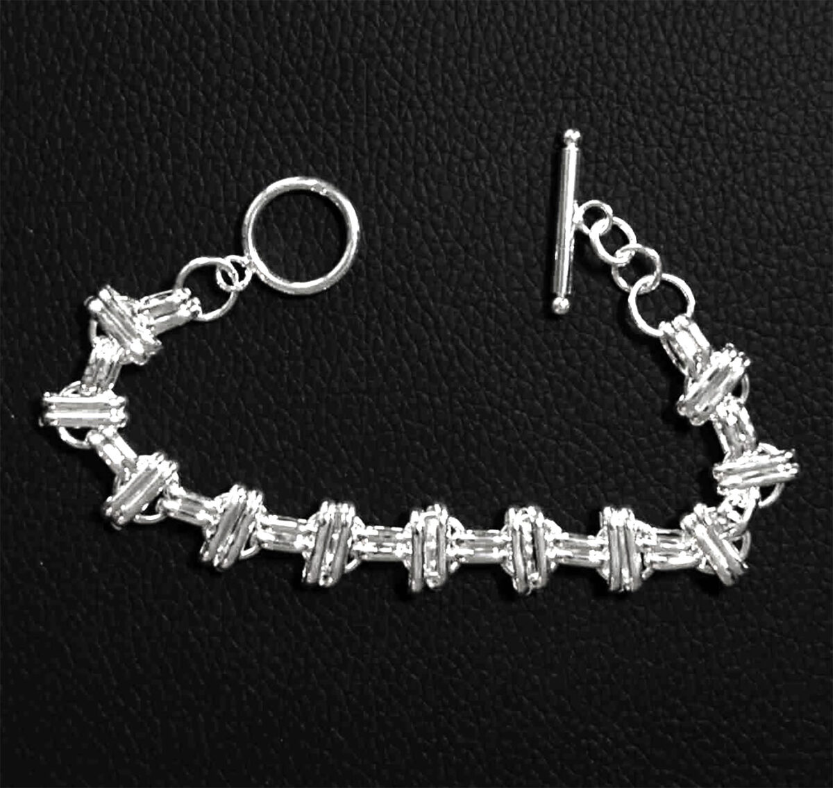 Sterling Silver Interlinked Grace Double Bar and Spaced Circles Bracelet with Toggle Clasp. 925ijewel.com
